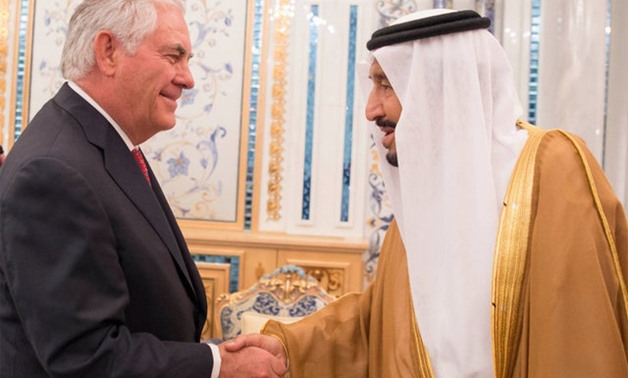Saudi Arabia's King Salman bin Abdulaziz Al Saud shakes hands with U.S. Secretary of State Rex Tillerson in Jeddah, Saudi Arabia July 12, 2017. Saudi Press Agency/Handout via REUTERS ATTENTION EDITORS - THIS PICTURE WAS PROVIDED BY A THIRD PARTY. NO RESAL