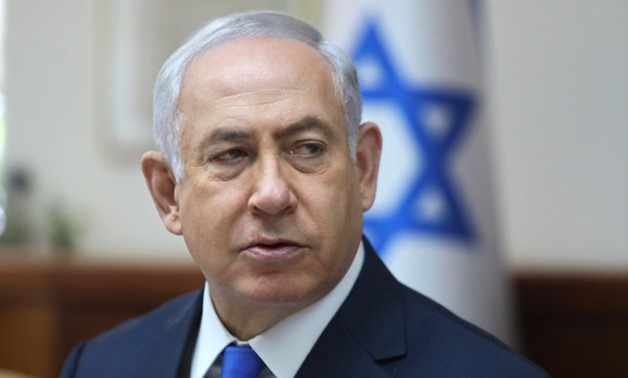 Israeli Prime Minister Benjamin Netanyahu (C) attends the weekly cabinet meeting in Jerusalem July 9, 2017. REUTERS