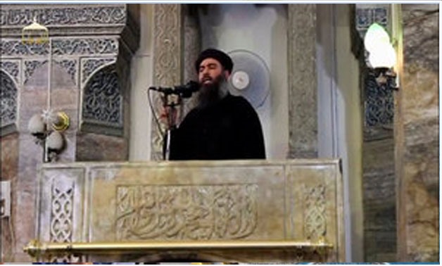 A man purported to be the reclusive leader of the militant Islamic State Abu Bakr al-Baghdadi making what would have been his first public appearance, at a mosque in Mosul -Reuters