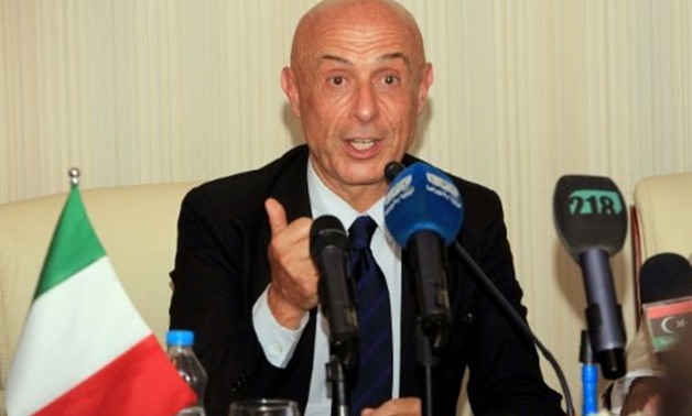 AFP | Italian Interior Minister Marco Minniti holds a press conference in the Libyan capital Tripoli on July 13, 2017, during a forum for cooperation between Italian and Libyan municipalities in the fight against illegal immigration