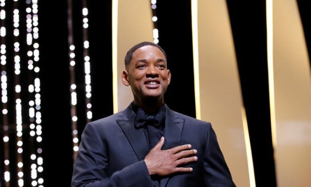 70th Cannes Film Festival - Closing ceremony - Cannes, France. 28/05/2017. Jury member Will Smith reacts on stage - Reuters/Stephane Mahe