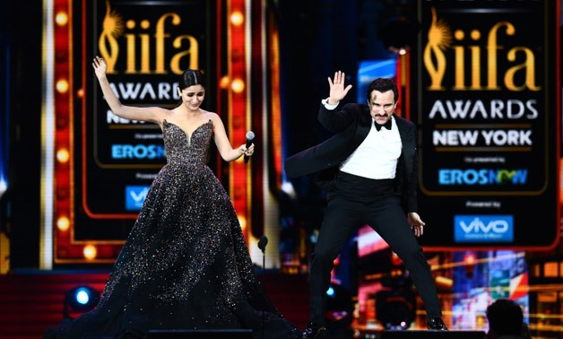 Bollywood actress Alia Bhatt and actor Salman Khan dance on stage during the 18th International Indian Film Academy (IIFA) Festival at the MetLife Stadium in East Rutherford, New Jersey