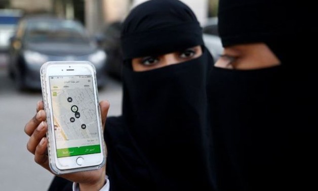 A Saudi woman shows the Careem app on her mobile phone in Riyadh, Saudi Arabia, January 2, 2017 - Reuters