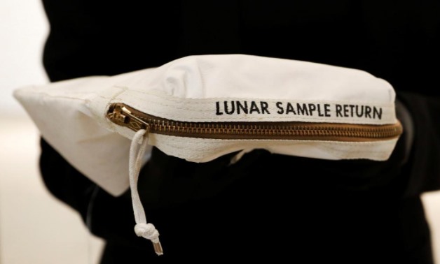 The Apollo 11 Contingency Lunar Sample Return Bag used by astronaut Neil Armstrong is displayed for Sotheby's Space Exploration auction in New York City, U.S., July 13, 2017 - Reuters/Brendan McDermid