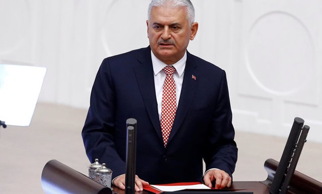 Turkey's PM Yildirim speaks during a special debate to commemorate the attempted coup in Ankara - Reuters