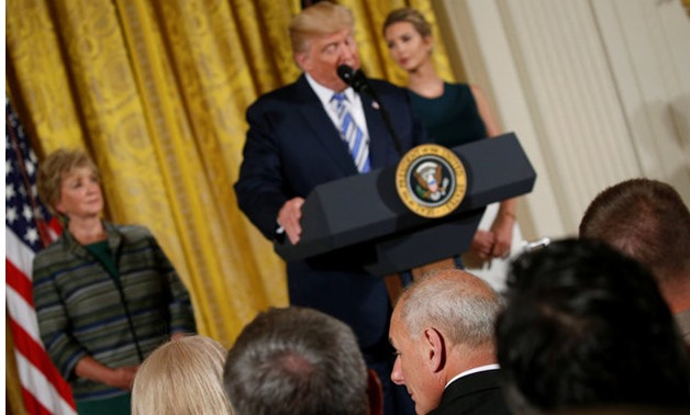 Kelly sits in the front row as Trump addresses a small business event at the White House in Washington-REUTERS