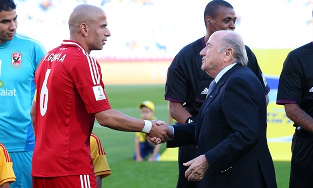 Wael Gomaa next to Sepp Blatter (former FIFA president) – Courtesy of  FIFA official website
