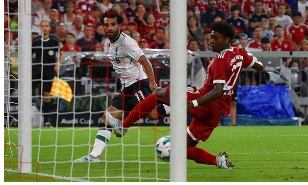 Mohamed Salah (white) – Liverpool’s Facebook Page