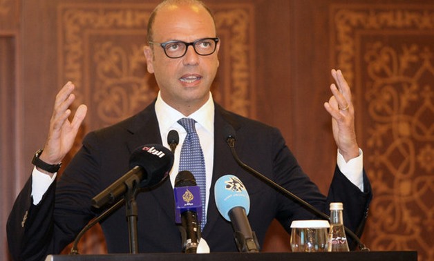 Italian foreign minister Angelino Alfano gestures during a joint news conference with Qatar's foreign minister Sheikh Mohammed bin Abdulrahman al-Thani in Doha, Qatar, August 2, 2017. REUTERS