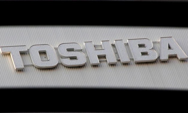 FILE PHOTO: A logo of Toshiba Corp is seen outside an electronics retail store in Tokyo, Japan, January 19, 2017.
Toru Hanai/File Photo