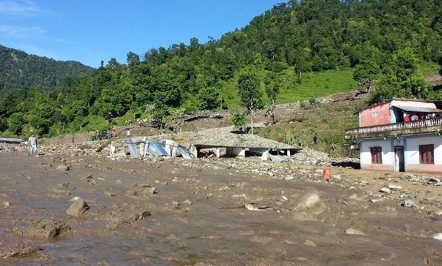 Landslides triggered by heavy rains kill 11 people in western Nepal
