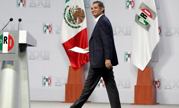 Enrique Ochoa Reza, Chairman of the Institutional Revolutionary Party (PRI) arrives to give his speech during their national assembly ahead of the 2018 - Reuters