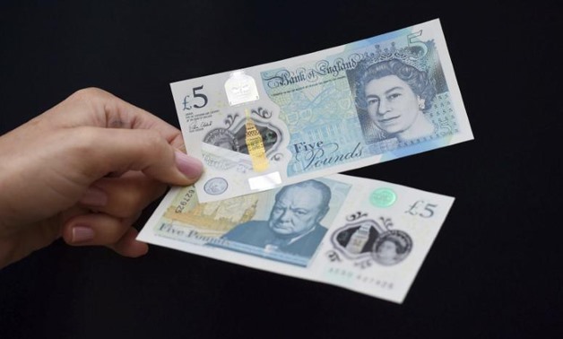 The new polymer 5 pound Sterling note featuring Sir Winston Churchill, is unveiled at Blenheim Palace in Oxfordshire, Britain June 2, 2016.
Joe Giddens/Pool