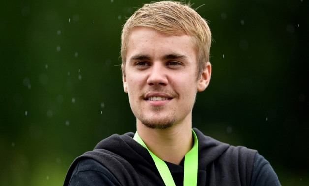 Pop superstar Justin Bieber, shown here at the practice round of a North Carolina golf tournament earlier this month, has released "Friends," a new single. Just last month, he canceled a world tour, citing "unforeseen circumstances"-AFP
