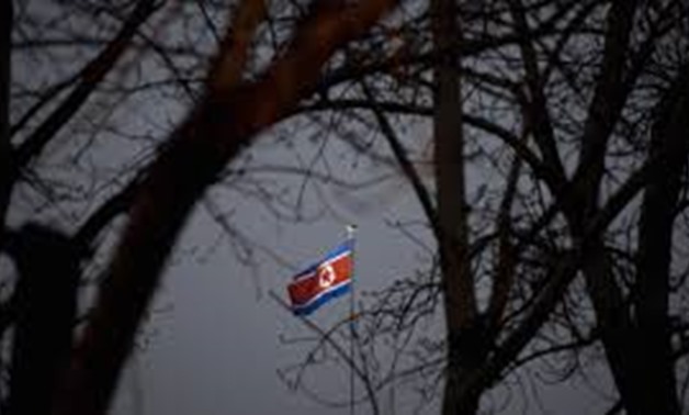 A North Korean flag is seen on the top of its embassy in Beijing, China, February 7, 2016  - REUTERS