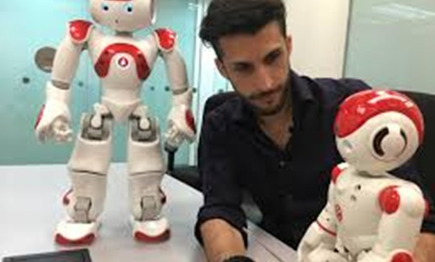 Lucas Apa, senior security consultant at cybersecurity company IOActive, handles robots by UBTech and SoftBank Robotics during a demonstration in Singapore August 21, 2017. Picture taken August 21, 2017.
Jeremy Wagstaff