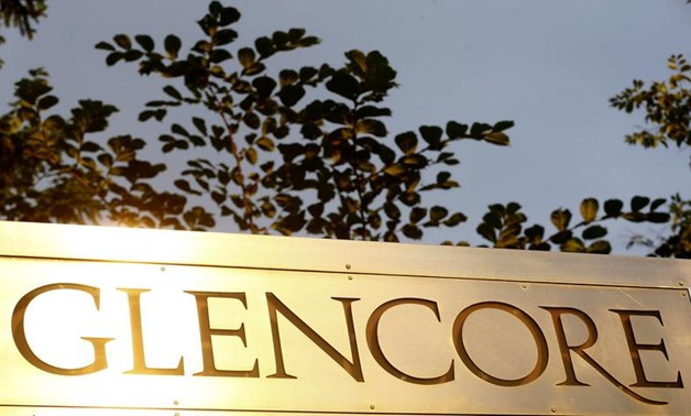 The logo of commodities trader Glencore is pictured in front of the company's headquarters in Baar, Switzerland, July 18, 2017- Reuters