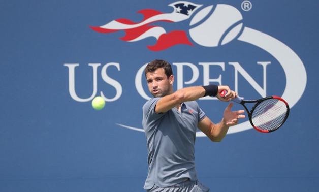 Grigor Dimitrov of Bulgaria returns a shot to Andrey Rublev of Russia on day four of the U.S. Open tennis tournament at USTA Billie Jean King National Tennis Center - REUTERS