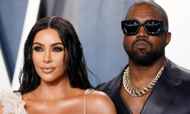 FILE PHOTO: Kim Kardashian and Kanye West attend the Vanity Fair Oscar party in Beverly Hills during the 92nd Academy Awards, in Los Angeles, California, U.S., February 9, 2020. REUTERS/Danny Moloshok