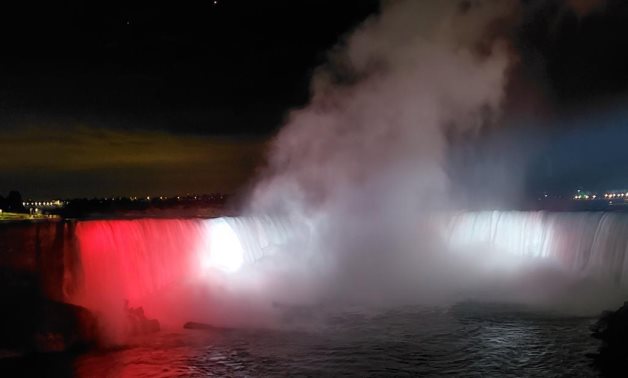 File: Niagara Falls lit up in the colors of the Egyptian flag to celebrate 68th anniversary of the July revolution