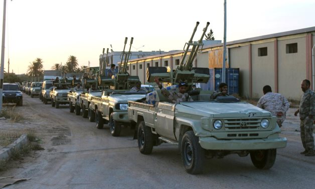Military vehicles of members of the Libyan GNA forces head out from Misrata to the front line in Tripoli, Misrata, Libya May 10, 2019. Reuters/Ayman Al-Sahili