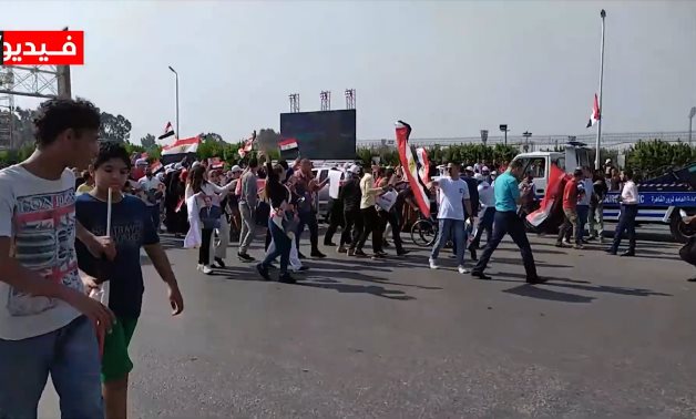 Hundreds of Egyptians took to streets around the Unknown Soldier Memorials in Cairo’s Nasr City to celebrate the 1973 victory