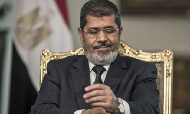 FILE – late Mohamed Morsi when he was president before ouster 