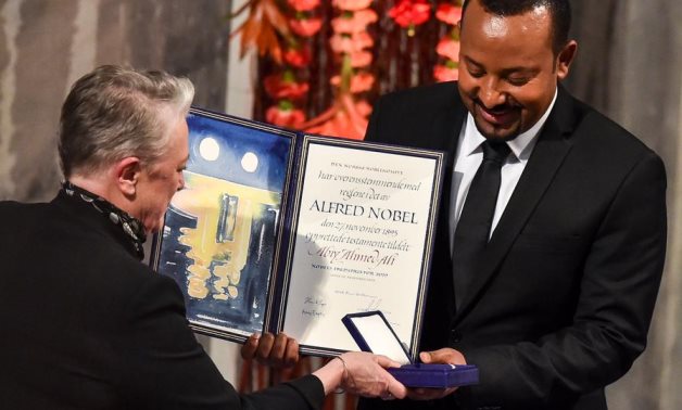 FILE PHOTO: Ethiopian Prime Minister Abiy Ahmed Ali receiving Nobel Peace Prize during ceremony in Oslo City Hall, Norway December 10, 2019. NTB Scanpix/Hakon Mosvold Larsen via REUTERS