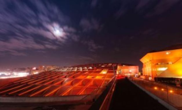 Egypt's Bibliotheca Alexandrina illuminated in orange during previous editions of the campaign - ET
