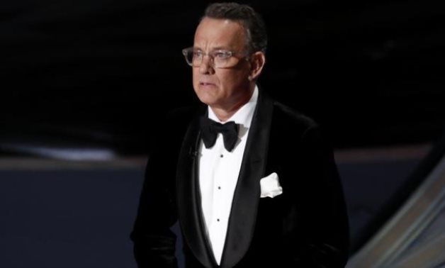 FILE PHOTO: Tom Hanks presents at the Oscars show during the 92nd Academy Awards in Hollywood, Los Angeles, California, U.S., February 9, 2020. REUTERS/Mario Anzuoni/File Photo