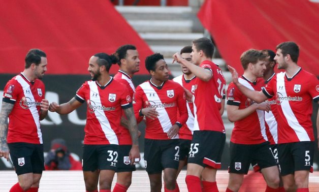 Southampton players celebrate scoring against Arsenal, Reuters 