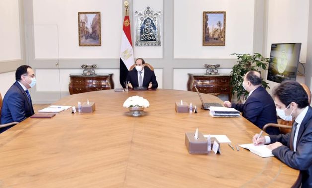 Egyptian President Abdel Fattah El Sisi meets with Prime Minister Mostafa Madbouly and Minister of Finance Mohamed Maait