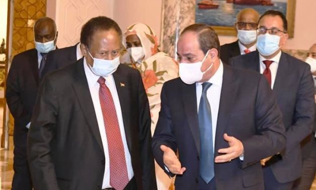 Egyptian President Abdel Fattah El-Sisi receives Sudan’s Prime Minister Abdalla Hamdok in Cairo, 11 March 2021 - Presidency