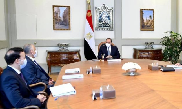 President Abdel Fatah al-Sisi in a meeting with CBE governor and officials on March 14, 2021. Press Photo 