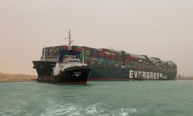 Attempts to save the aground cargo ship "Ever Given" in Suez Canal on March 24, 2021. Press Photo