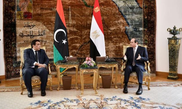 President Abdel Fattah El-Sisi (R) receives in Cairo on Thursday head of the Libyan Presidency Council Mohammad al-Menfi – Presidency