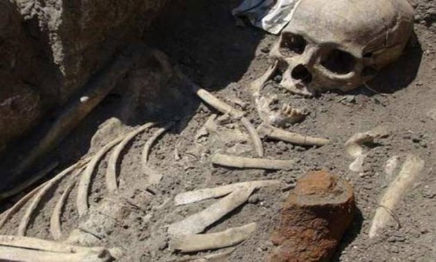 FILE - Human skeletal remains