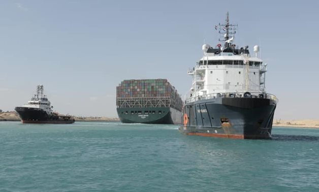 A photo shows the giant Ever Given ship being tugged successfully toward The Bitter Lake – Suez Canal Authority