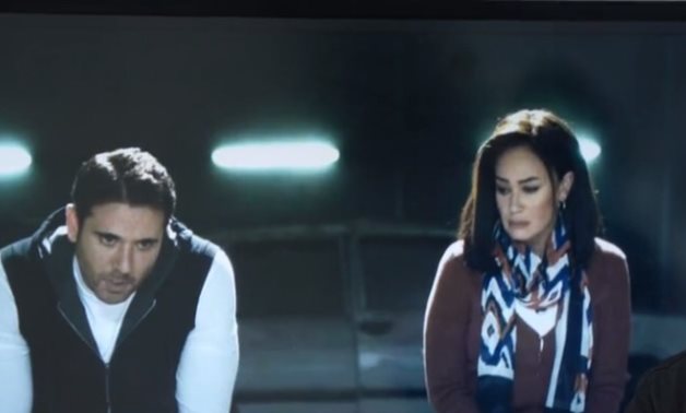 File: Ahmed Ezz and Hend Sabry in a scene from Hagma Mortada series.