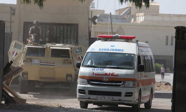 FILE - Egyptian ambulances at the Rafah border crossing - Reuters
