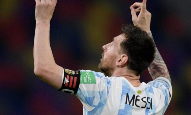 Lionel Messi celebrates after scoring Argentina's goal via penalty, Reuters