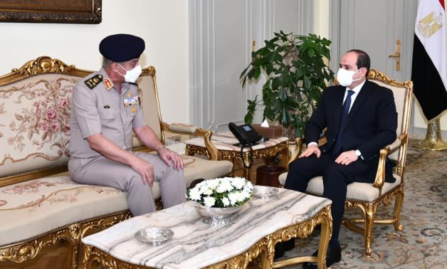 Egyptian President Abdel Fattah El-Sisi (R) receives Minister of Defense Mohamed Zaki – Presidency 