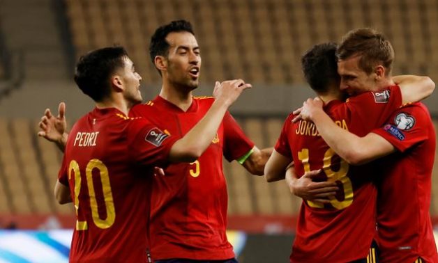 Spain's Dani Olmo celebrates scoring their first goal with Jordi Alba, Pedri and Sergio Busquets REUTERS/Marcelo Del Pozo