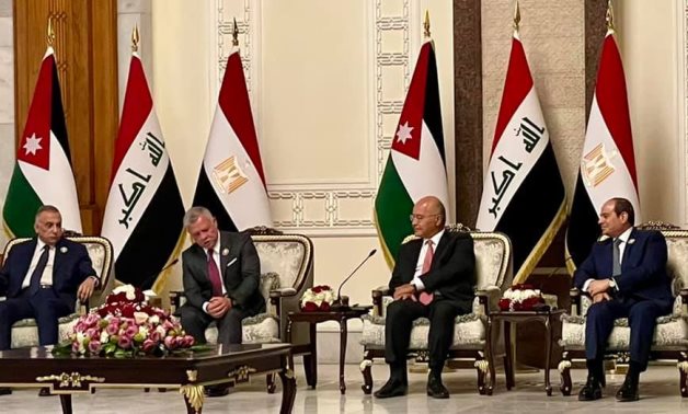 Sisi of Egypt (right), Saleh of Iraq (second right) Jordan's Abdullah (second left), Iraqi Prime Minister Mustafa al-Kadhimi - press photo