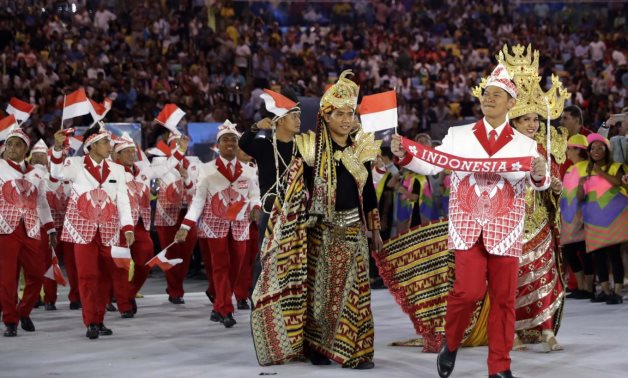 Team Indonesia arrives during the opening ceremony for the 2016 Summer Olympics in Rio de Janeiro (AP Photo/David J. Phillip)