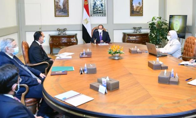 President Sisi meets with Prime Minister Moustafa Madbouli and Minister of Health Hala Zayed and other officials in the health sector on August 16, 2021- press photo