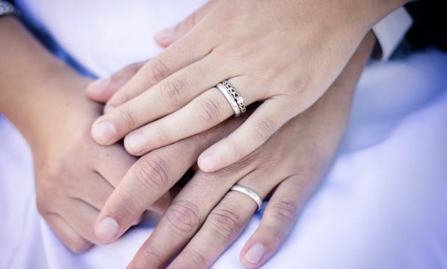 FILE - Marriage rings – Creative Commons