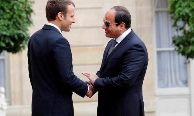 FILE- French President Emmanuel Macron receives President Abdel Fatah al-Sisi at the Elysee Palace Tuesday Oct.24, 2017 - Reuters