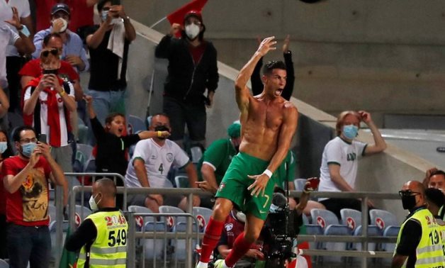 Portugal's Cristiano Ronaldo celebrates scoring their second goal REUTERS 