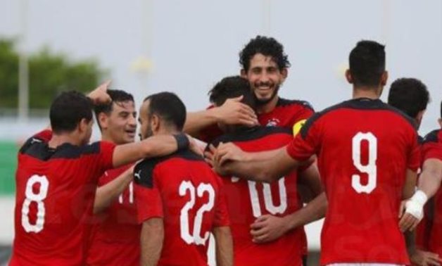 File- Egypt national team players celebrate scoring a goal
